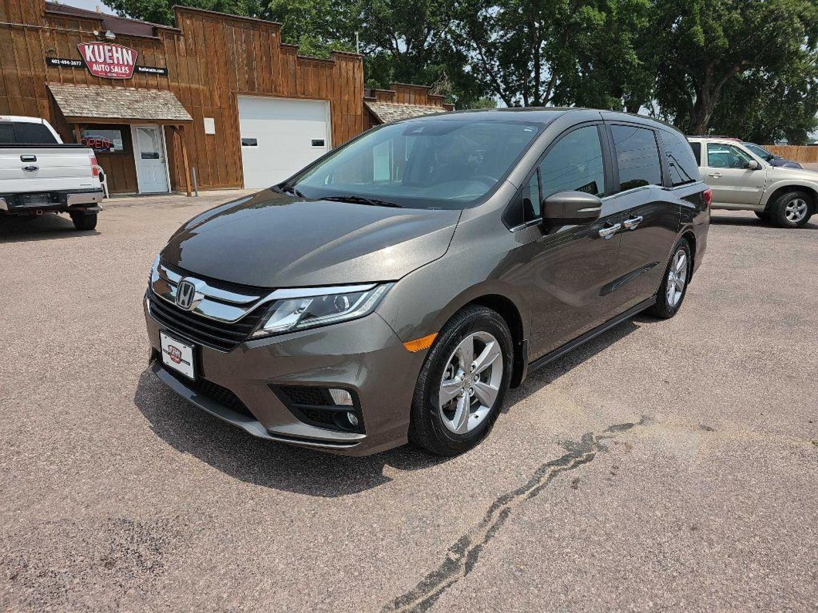 2018 BRONZE HONDA ODYSSEY EXL (5FNRL6H71JB) with an 3.5L engine, Automatic transmission, located at 495 Old Highway 20 West, South Sioux City, NE, 68776, (402) 494-2677, 42.458408, -96.443512 - Photo #0