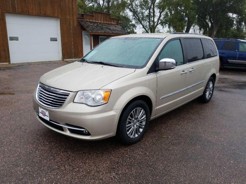 2014 TAN CHRYSLER TOWN and COUNTRY TOURING L (2C4RC1CG8ER) with an 3.6L engine, Automatic transmission, located at 495 Old Highway 20 West, South Sioux City, NE, 68776, (402) 494-2677, 42.458408, -96.443512 - Photo #0