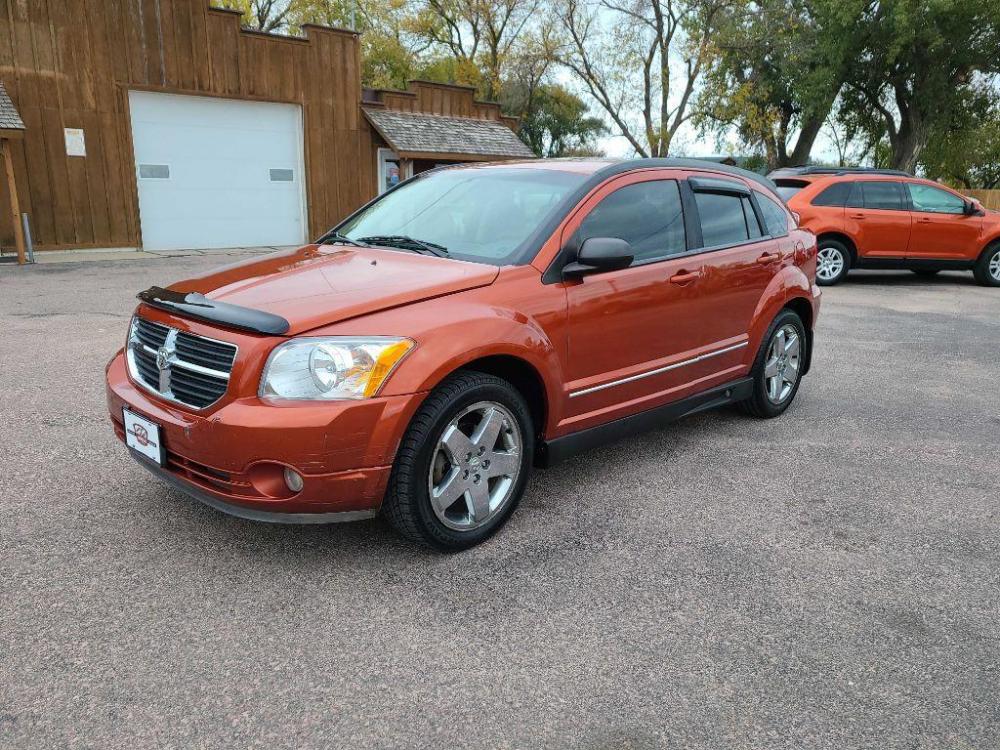 2008 ORANGE DODGE CALIBER R/T (1B3HB78KX8D) with an 2.4L engine, 5-Speed Manual transmission, located at 495 Old Highway 20 West, South Sioux City, NE, 68776, (402) 494-2677, 42.458408, -96.443512 - Photo #0