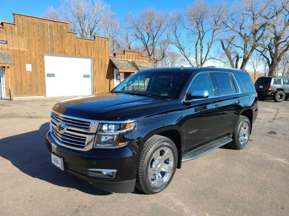 2015 BLACK CHEVROLET TAHOE 1500 LTZ (1GNSKCKC5FR) with an 5.3L engine, Automatic transmission, located at 495 Old Highway 20 West, South Sioux City, NE, 68776, (402) 494-2677, 42.458408, -96.443512 - Photo #0