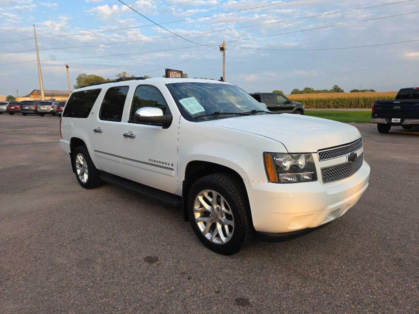 2009 WHITE CHEVROLET SUBURBAN 1500 LTZ (1GNFK36369R) with an 5.3L engine, Automatic transmission, located at 495 Old Highway 20 West, South Sioux City, NE, 68776, (402) 494-2677, 42.458408, -96.443512 - Photo#9