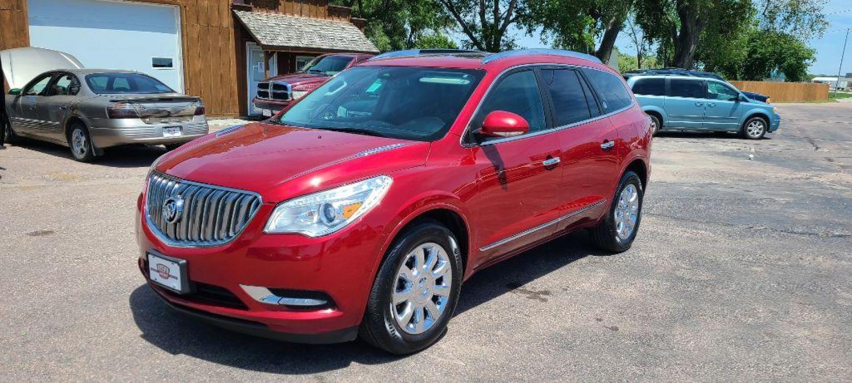 2013 MAROON BUICK ENCLAVE (5GAKVCKD0DJ) with an 3.6L engine, Automatic transmission, located at 495 Old Highway 20 West, South Sioux City, NE, 68776, (402) 494-2677, 42.458408, -96.443512 - Photo #0