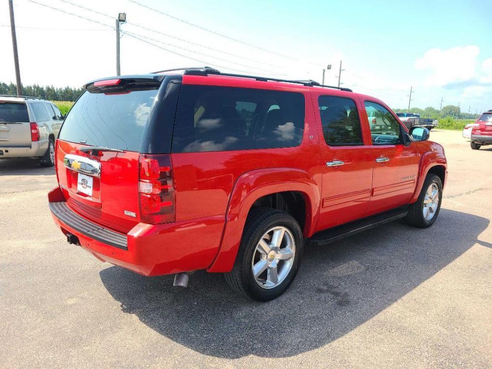 2012 RED CHEVROLET SUBURBAN 1500 LT (1GNSKJE73CR) with an 5.3L engine, Automatic transmission, located at 495 Old Highway 20 West, South Sioux City, NE, 68776, (402) 494-2677, 42.458408, -96.443512 - Photo #1