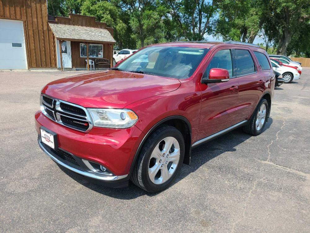 2014 MAROON DODGE DURANGO LIMITED (1C4RDJDG1EC) with an 3.6L engine, Automatic transmission, located at 495 Old Highway 20 West, South Sioux City, NE, 68776, (402) 494-2677, 42.458408, -96.443512 - Photo #0