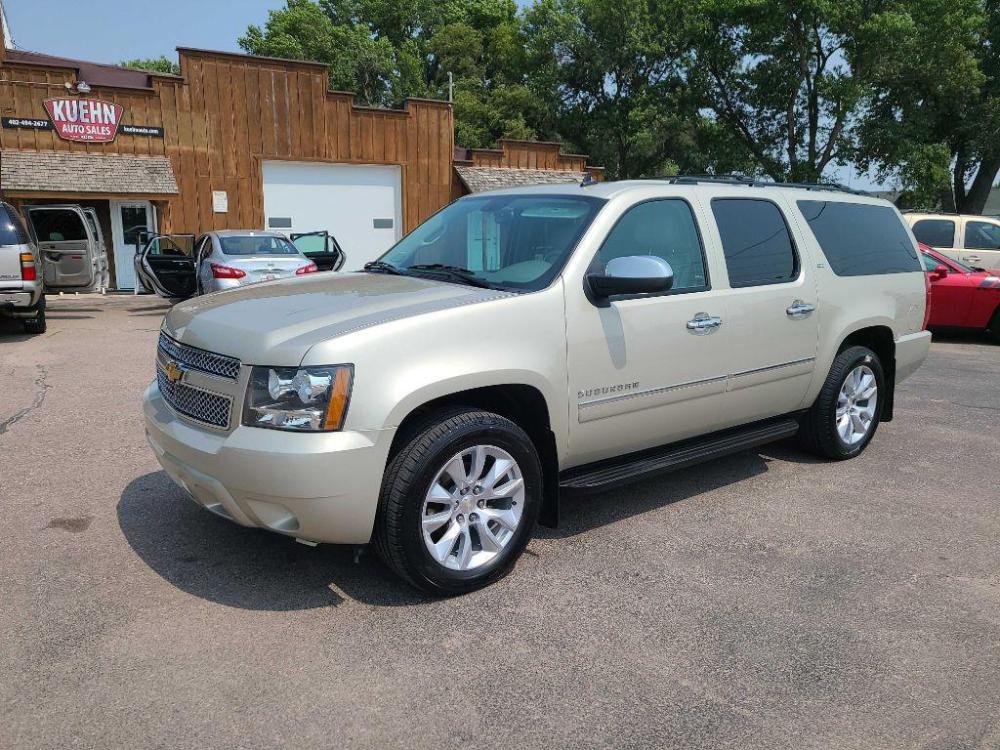 2013 TAN CHEVROLET SUBURBAN 1500 LTZ (1GNSKKE79DR) with an 5.3L engine, Automatic transmission, located at 495 Old Highway 20 West, South Sioux City, NE, 68776, (402) 494-2677, 42.458408, -96.443512 - Photo #0