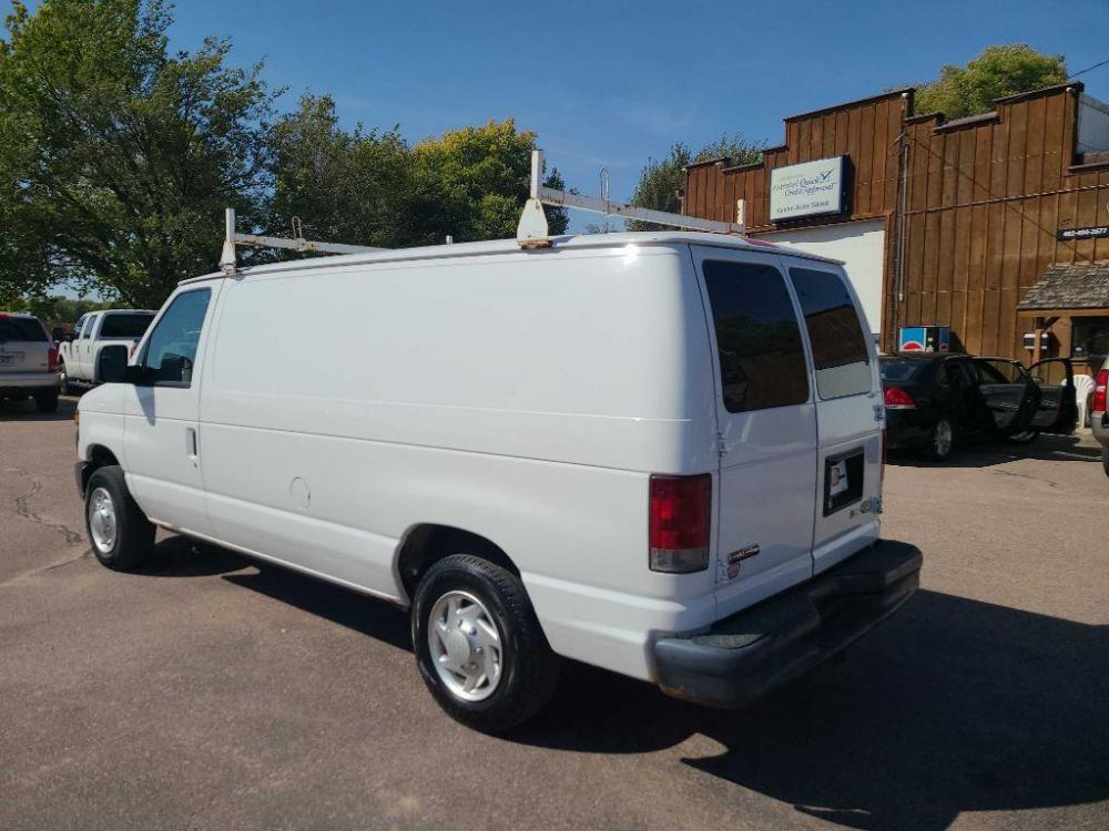 2010 WHITE FORD ECONOLINE E150 VAN (1FTNE1EL2AD) with an 5.4L engine, Automatic transmission, located at 495 Old Highway 20 West, South Sioux City, NE, 68776, (402) 494-2677, 42.458408, -96.443512 - Photo #2