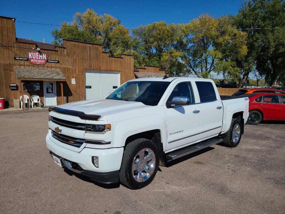 2018 WHITE CHEVROLET SILVERADO 1500 LTZ (3GCUKSEJ7JG) with an 6.2L engine, Automatic transmission, located at 495 Old Highway 20 West, South Sioux City, NE, 68776, (402) 494-2677, 42.458408, -96.443512 - Photo #0