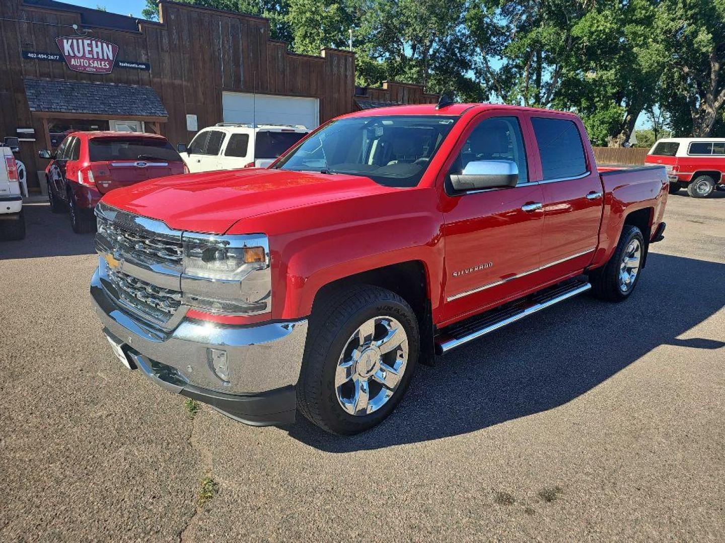 2017 RED CHEVROLET SILVERADO 1500 LTZ (3GCUKSEC1HG) with an 5.3L engine, Automatic transmission, located at 495 Old Highway 20 West, South Sioux City, NE, 68776, (402) 494-2677, 42.458408, -96.443512 - Photo#0