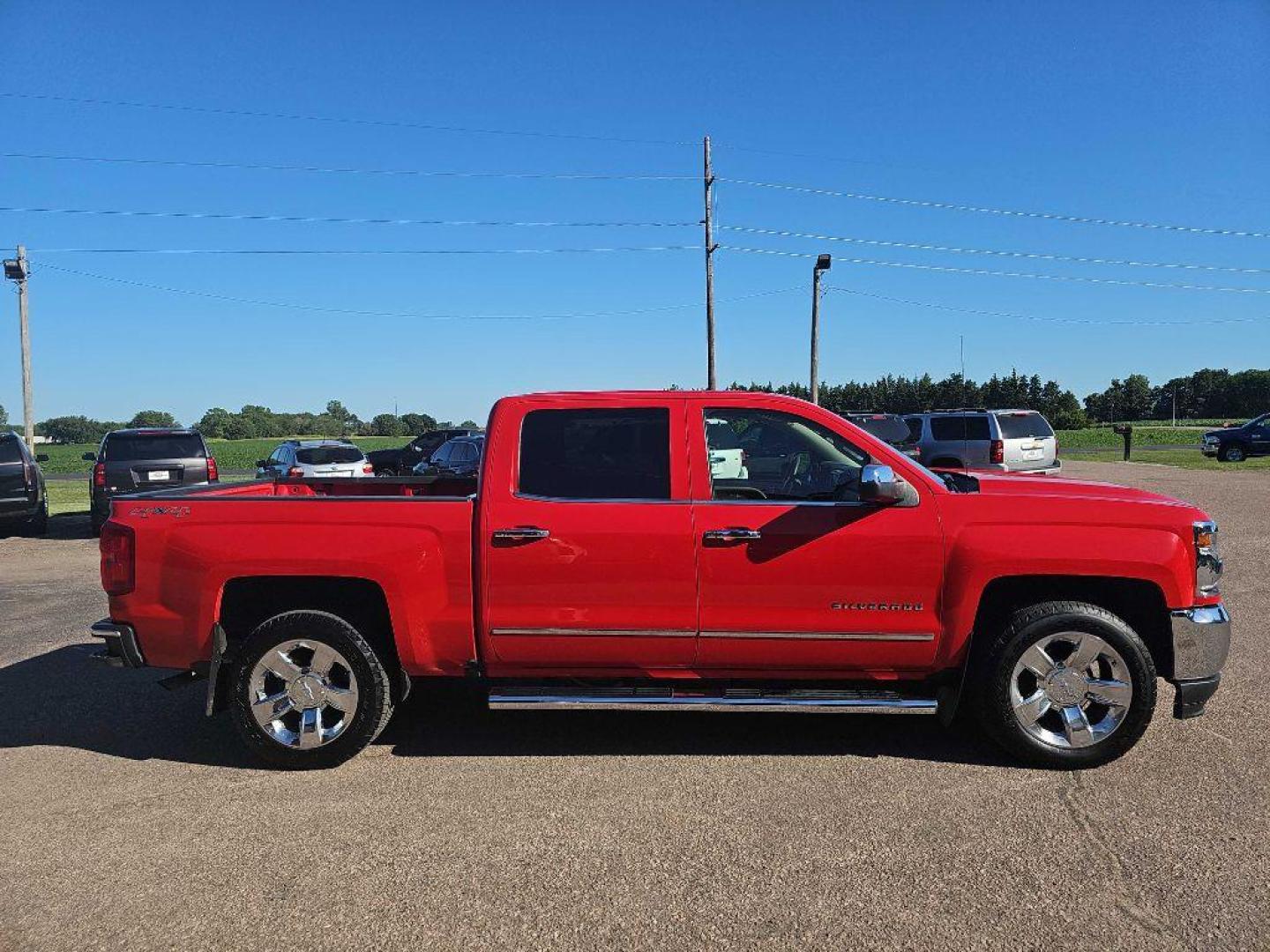 2017 RED CHEVROLET SILVERADO 1500 LTZ (3GCUKSEC1HG) with an 5.3L engine, Automatic transmission, located at 495 Old Highway 20 West, South Sioux City, NE, 68776, (402) 494-2677, 42.458408, -96.443512 - Photo#2