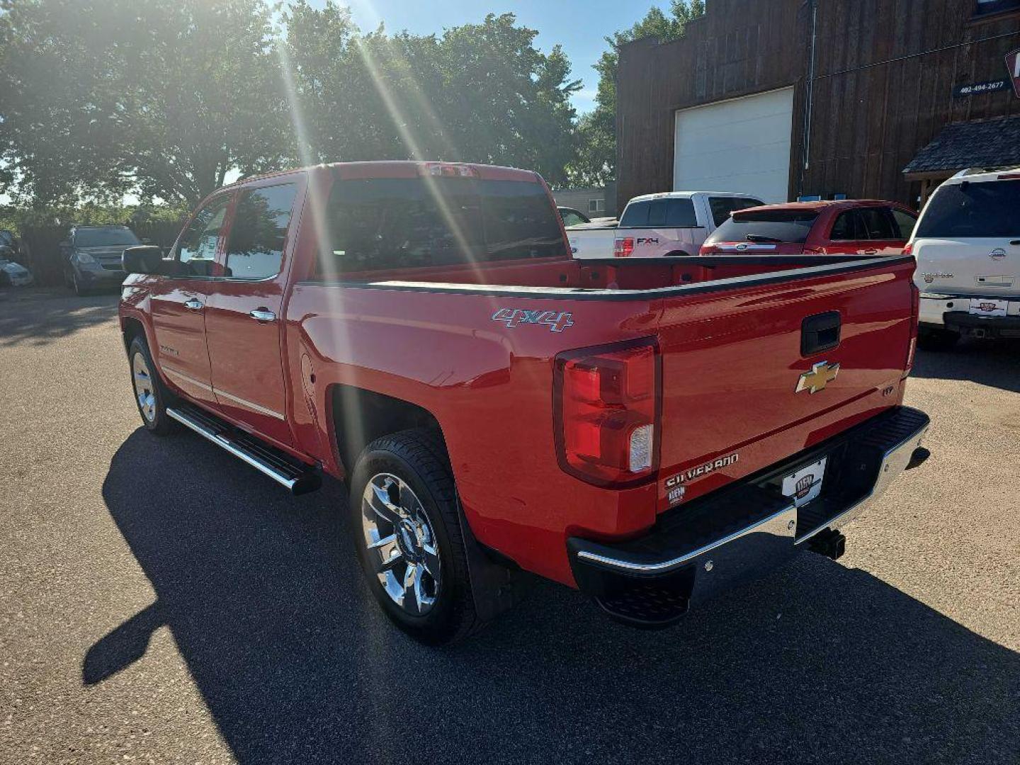 2017 RED CHEVROLET SILVERADO 1500 LTZ (3GCUKSEC1HG) with an 5.3L engine, Automatic transmission, located at 495 Old Highway 20 West, South Sioux City, NE, 68776, (402) 494-2677, 42.458408, -96.443512 - Photo#6