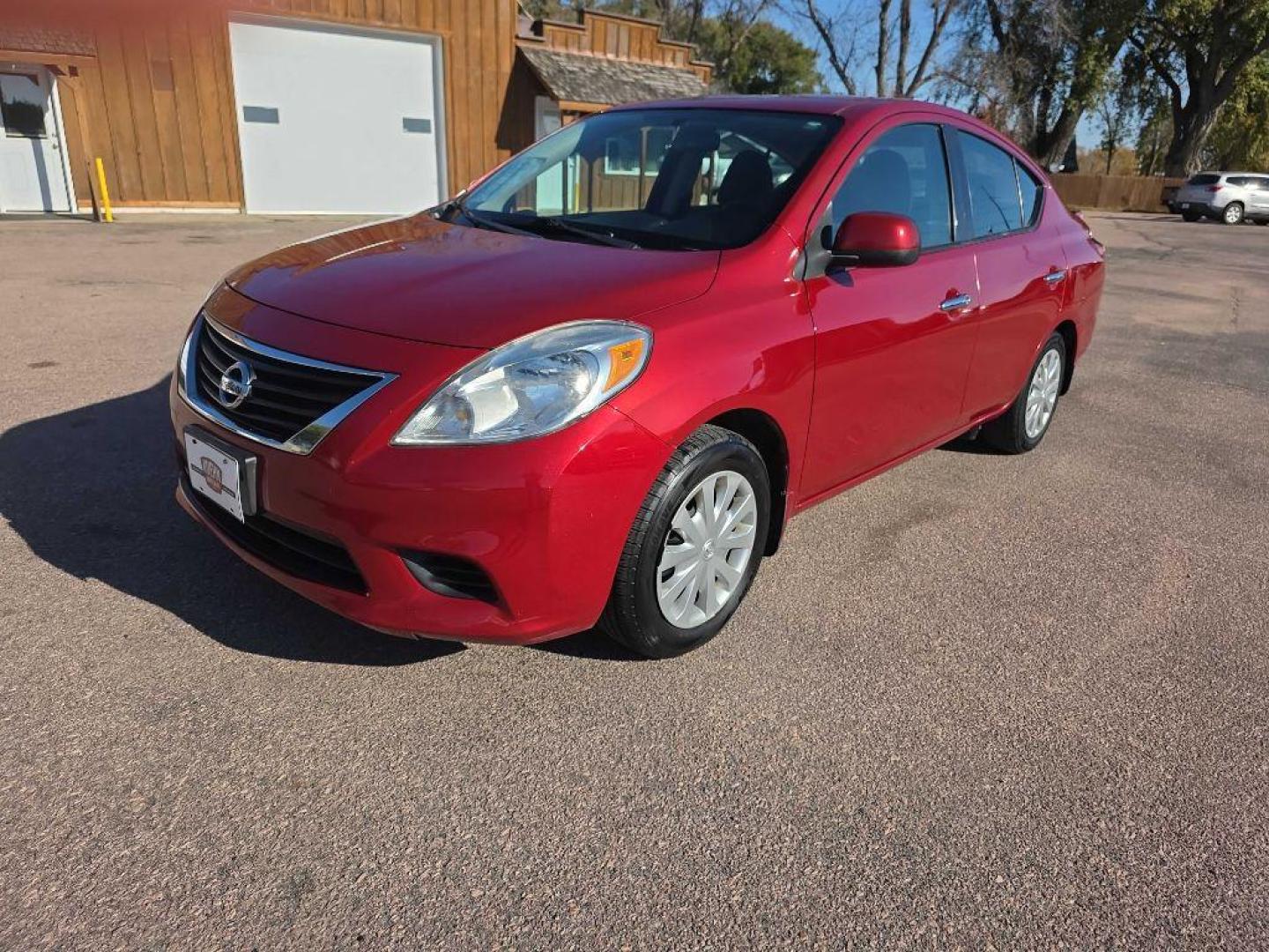 2014 MAROON NISSAN VERSA S (3N1CN7AP5EK) with an 1.6L engine, Continuously Variable transmission, located at 495 Old Highway 20 West, South Sioux City, NE, 68776, (402) 494-2677, 42.458408, -96.443512 - Photo#0