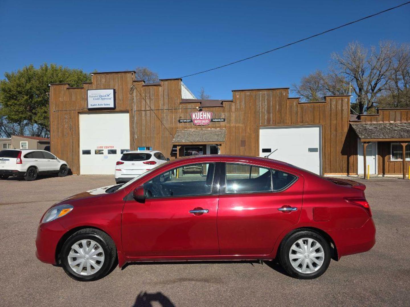 2014 MAROON NISSAN VERSA S (3N1CN7AP5EK) with an 1.6L engine, Continuously Variable transmission, located at 495 Old Highway 20 West, South Sioux City, NE, 68776, (402) 494-2677, 42.458408, -96.443512 - Photo#1