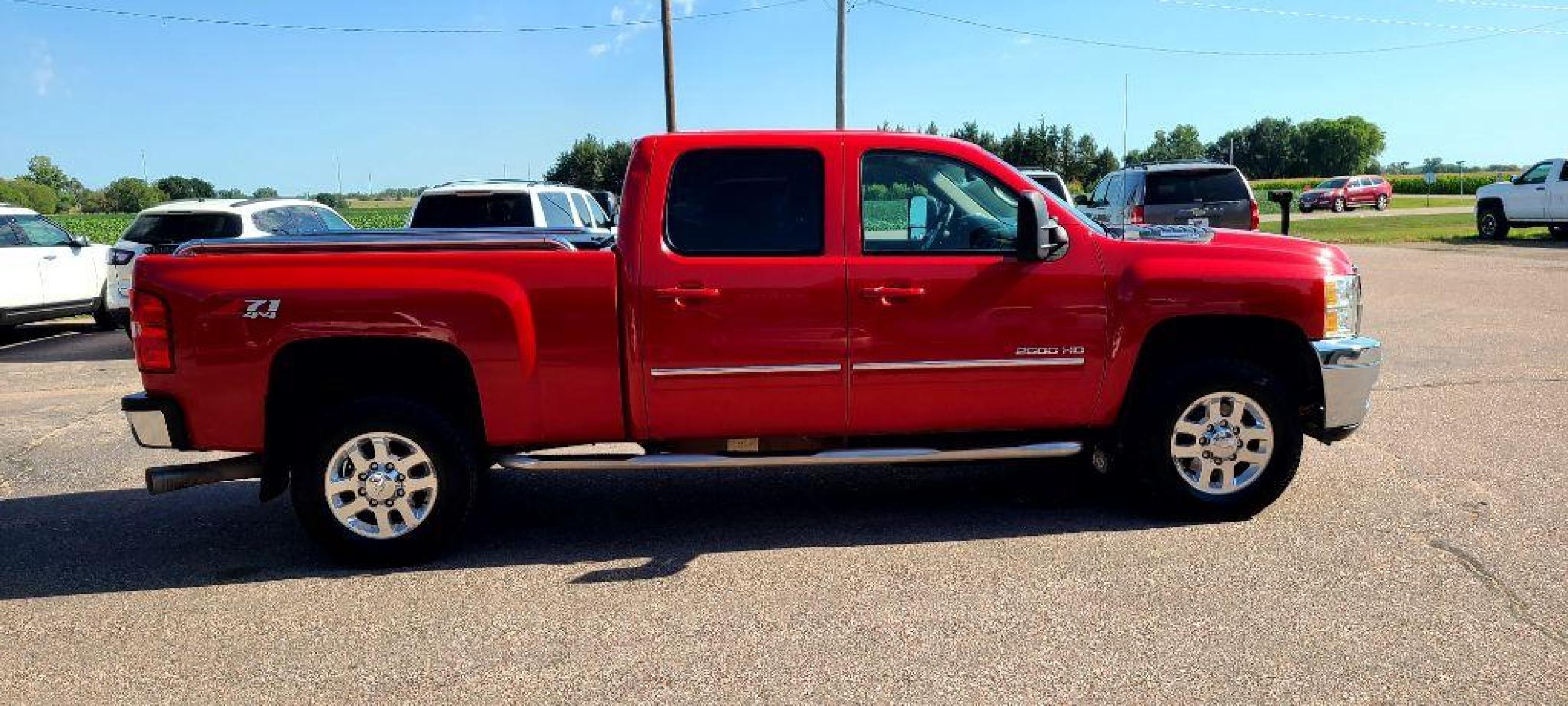 2013 RED CHEVROLET SILVERADO 2500 HEAVY DUTY LTZ (1GC1KYE84DF) with an 6.6L engine, Automatic transmission, located at 495 Old Highway 20 West, South Sioux City, NE, 68776, (402) 494-2677, 42.458408, -96.443512 - Photo #4