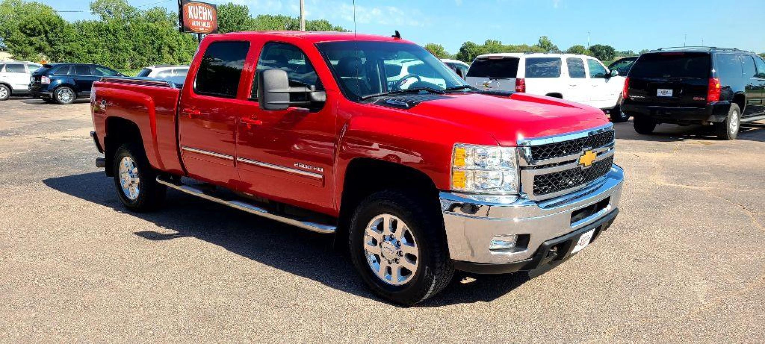2013 RED CHEVROLET SILVERADO 2500 HEAVY DUTY LTZ (1GC1KYE84DF) with an 6.6L engine, Automatic transmission, located at 495 Old Highway 20 West, South Sioux City, NE, 68776, (402) 494-2677, 42.458408, -96.443512 - Photo #5