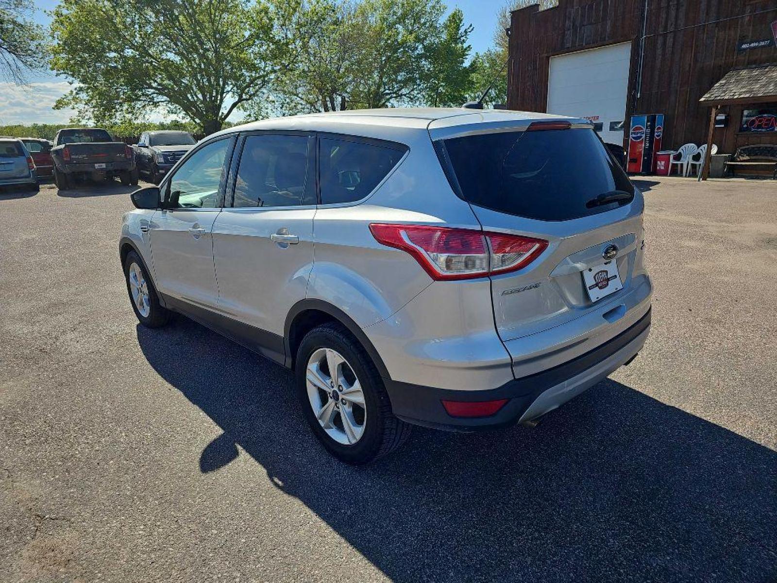 2016 SILVER FORD ESCAPE SE (1FMCU9GX8GU) with an 1.6L engine, Automatic transmission, located at 495 Old Highway 20 West, South Sioux City, NE, 68776, (402) 494-2677, 42.458408, -96.443512 - Photo #6