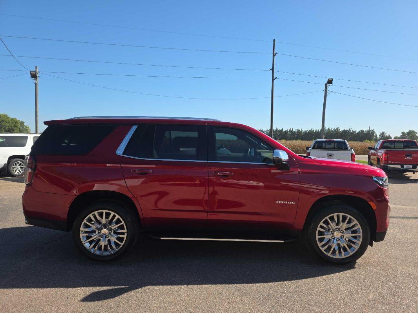 2024 RED CHEVROLET TAHOE 1500 PREMIER (1GNSKSKD2RR) with an 5.3L engine, Automatic transmission, located at 495 Old Highway 20 West, South Sioux City, NE, 68776, (402) 494-2677, 42.458408, -96.443512 - Photo#30