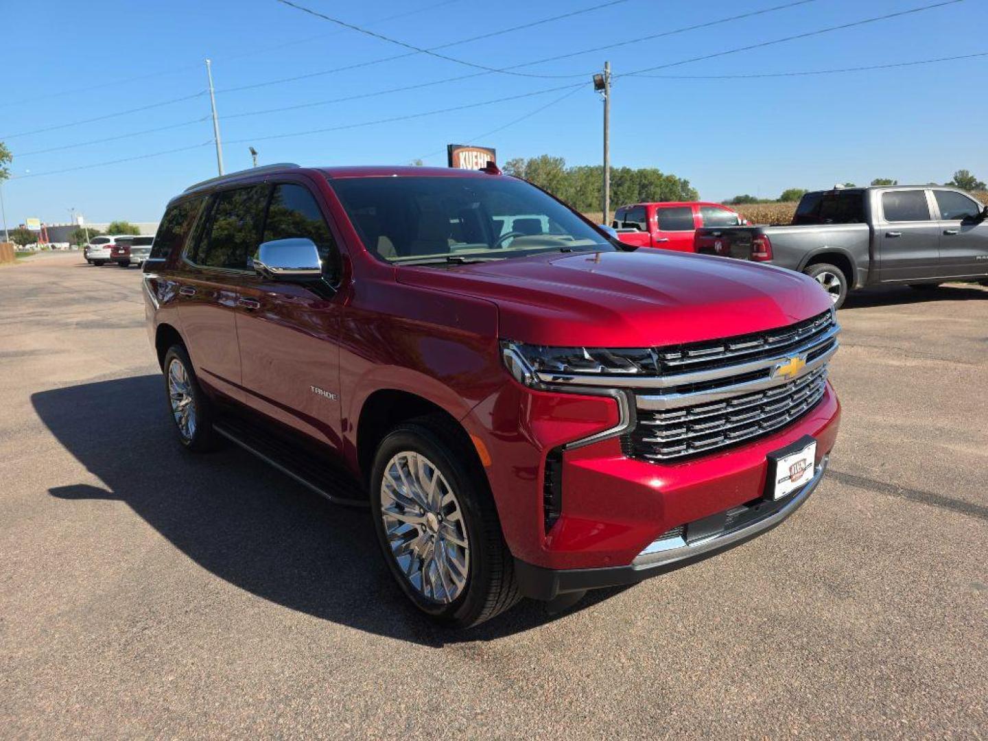 2024 RED CHEVROLET TAHOE 1500 PREMIER (1GNSKSKD2RR) with an 5.3L engine, Automatic transmission, located at 495 Old Highway 20 West, South Sioux City, NE, 68776, (402) 494-2677, 42.458408, -96.443512 - Photo#31