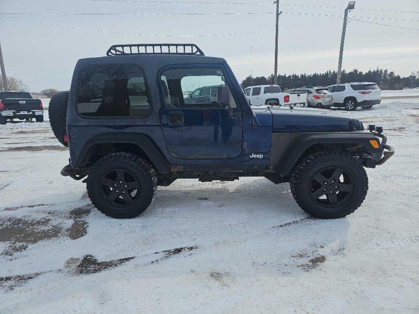 2001 BLUE JEEP WRANGLER / TJ SPORT (1J4FA49S11P) with an 4.0L engine, Automatic transmission, located at 495 Old Highway 20 West, South Sioux City, NE, 68776, (402) 494-2677, 42.458408, -96.443512 - Photo#4