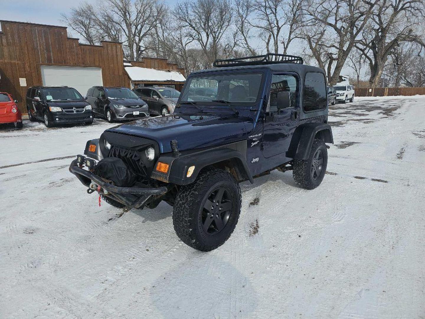 2001 BLUE JEEP WRANGLER / TJ SPORT (1J4FA49S11P) with an 4.0L engine, Automatic transmission, located at 495 Old Highway 20 West, South Sioux City, NE, 68776, (402) 494-2677, 42.458408, -96.443512 - Photo#0