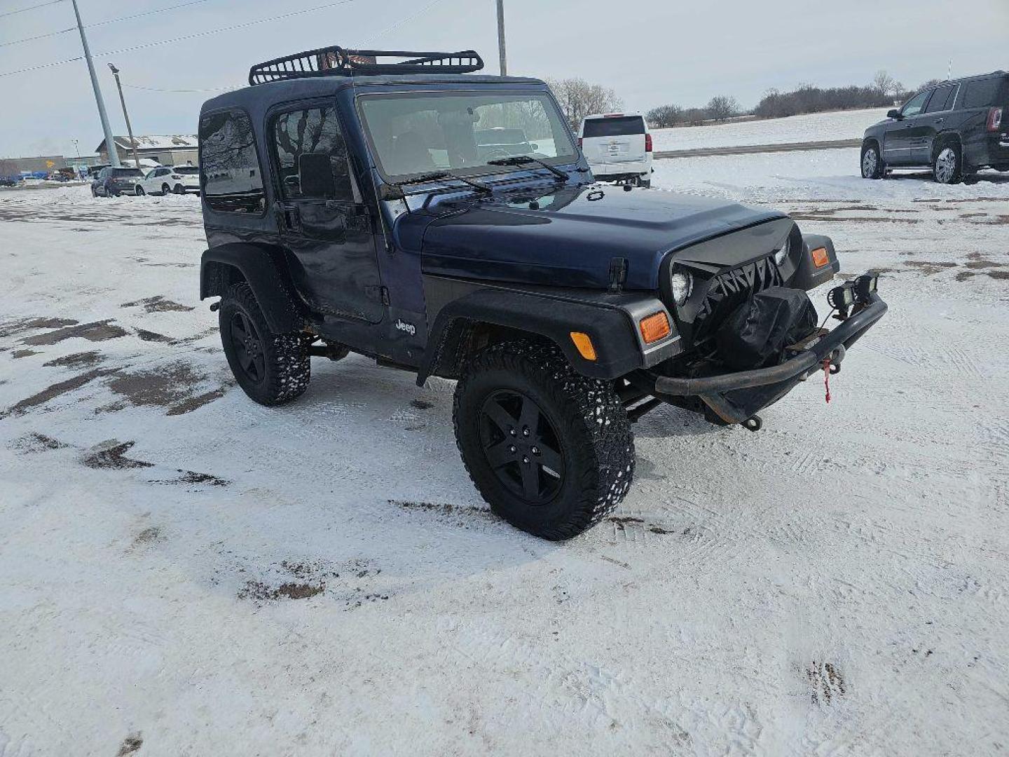 2001 BLUE JEEP WRANGLER / TJ SPORT (1J4FA49S11P) with an 4.0L engine, Automatic transmission, located at 495 Old Highway 20 West, South Sioux City, NE, 68776, (402) 494-2677, 42.458408, -96.443512 - Photo#5