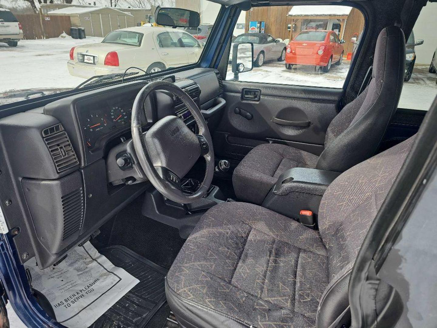 2001 BLUE JEEP WRANGLER / TJ SPORT (1J4FA49S11P) with an 4.0L engine, Automatic transmission, located at 495 Old Highway 20 West, South Sioux City, NE, 68776, (402) 494-2677, 42.458408, -96.443512 - Photo#7