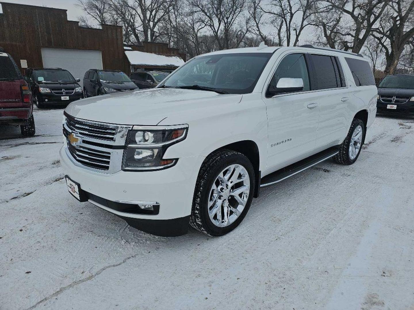 2015 WHITE CHEVROLET SUBURBAN 1500 LTZ (1GNSKKKC5FR) with an 5.3L engine, Automatic transmission, located at 495 Old Highway 20 West, South Sioux City, NE, 68776, (402) 494-2677, 42.458408, -96.443512 - Photo#0