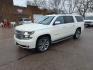 2015 WHITE CHEVROLET SUBURBAN 1500 LTZ (1GNSKKKC4FR) with an 5.3L engine, Automatic transmission, located at 495 Old Highway 20 West, South Sioux City, NE, 68776, (402) 494-2677, 42.458408, -96.443512 - Photo#0