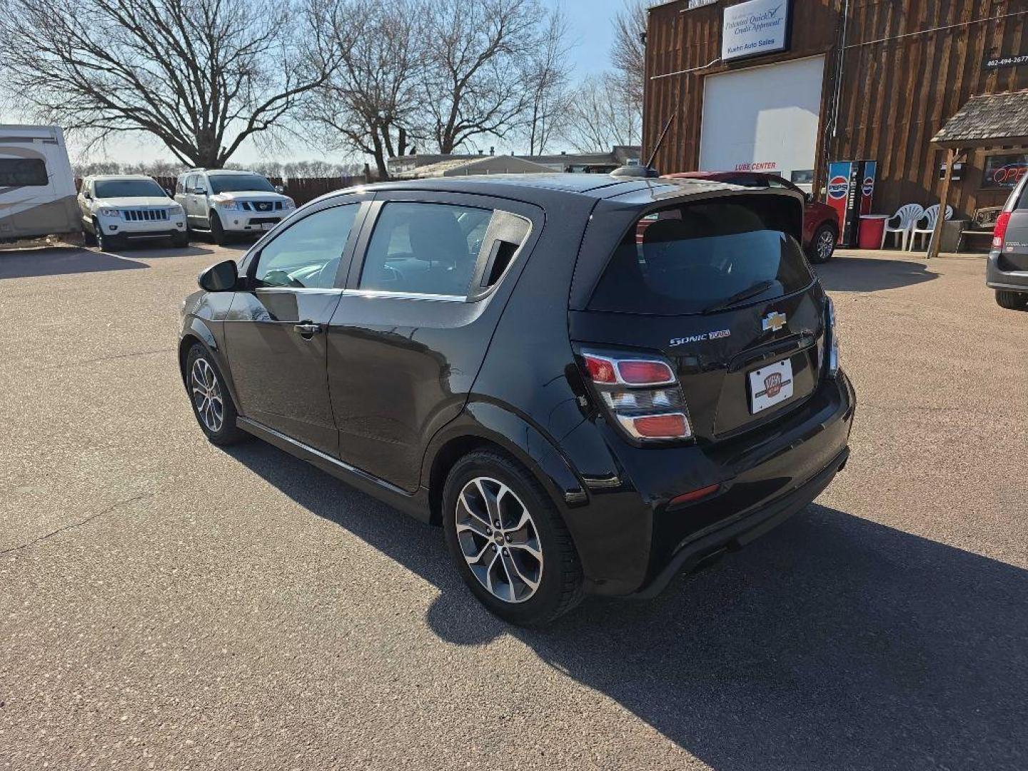 2017 BLACK CHEVROLET SONIC LT (1G1JC6SB9H4) with an 1.4L engine, 6-Speed Manual transmission, located at 495 Old Highway 20 West, South Sioux City, NE, 68776, (402) 494-2677, 42.458408, -96.443512 - Photo#2