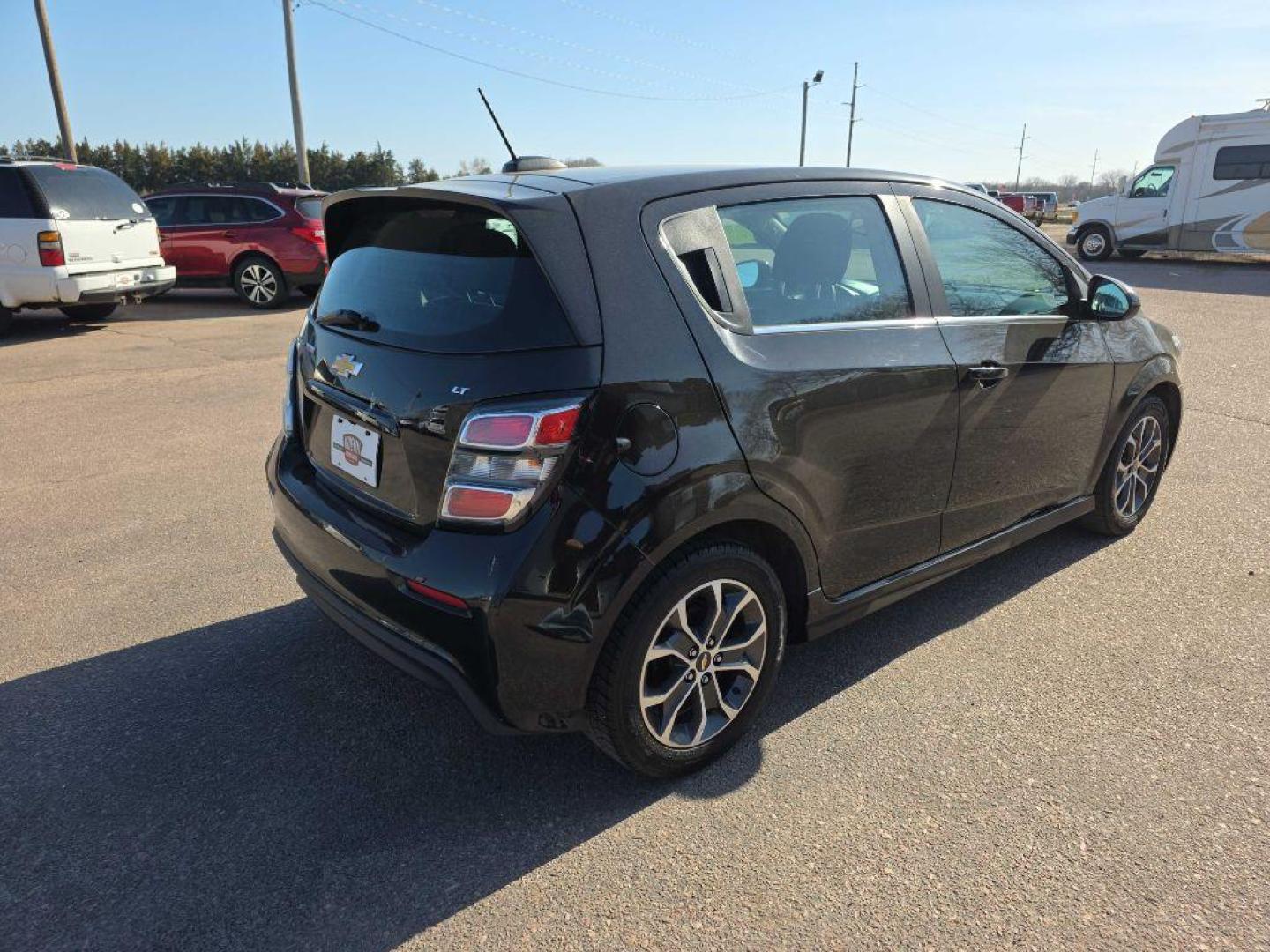 2017 BLACK CHEVROLET SONIC LT (1G1JC6SB9H4) with an 1.4L engine, 6-Speed Manual transmission, located at 495 Old Highway 20 West, South Sioux City, NE, 68776, (402) 494-2677, 42.458408, -96.443512 - Photo#3