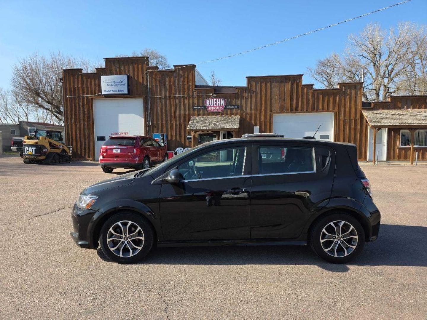 2017 BLACK CHEVROLET SONIC LT (1G1JC6SB9H4) with an 1.4L engine, 6-Speed Manual transmission, located at 495 Old Highway 20 West, South Sioux City, NE, 68776, (402) 494-2677, 42.458408, -96.443512 - Photo#1