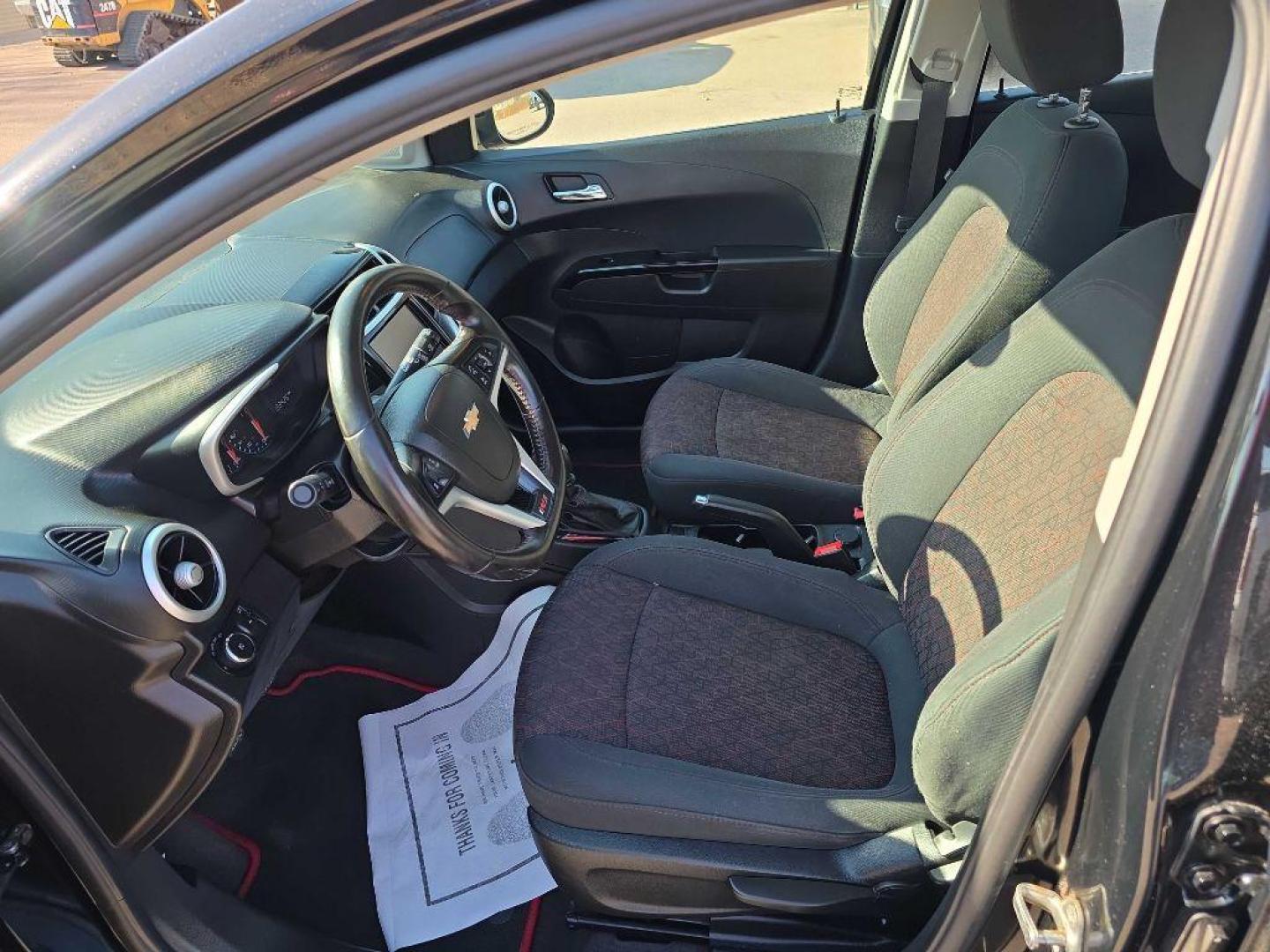 2017 BLACK CHEVROLET SONIC LT (1G1JC6SB9H4) with an 1.4L engine, 6-Speed Manual transmission, located at 495 Old Highway 20 West, South Sioux City, NE, 68776, (402) 494-2677, 42.458408, -96.443512 - Photo#7