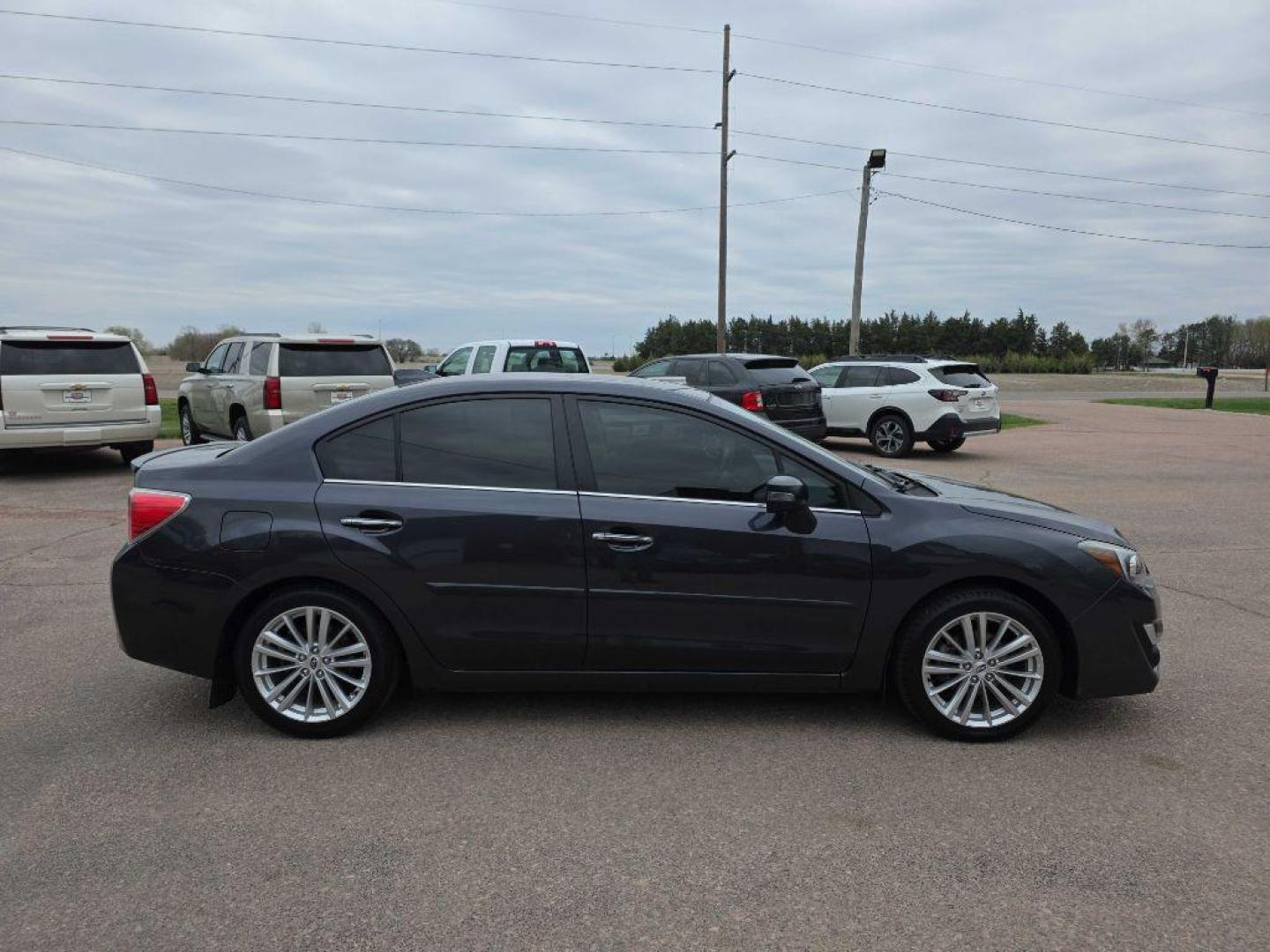 2016 GRAY SUBARU IMPREZA LIMITED (JF1GJAN61GH) with an 2.0L engine, Continuously Variable transmission, located at 495 Old Highway 20 West, South Sioux City, NE, 68776, (402) 494-2677, 42.458408, -96.443512 - Photo#1