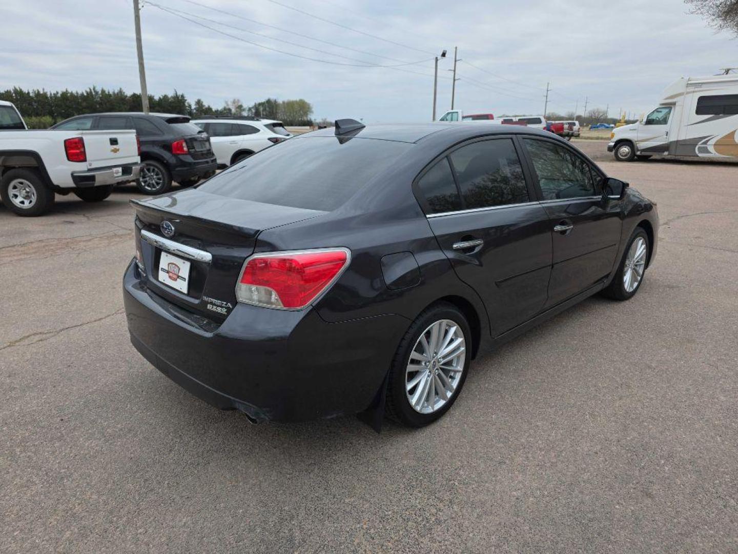 2016 GRAY SUBARU IMPREZA LIMITED (JF1GJAN61GH) with an 2.0L engine, Continuously Variable transmission, located at 495 Old Highway 20 West, South Sioux City, NE, 68776, (402) 494-2677, 42.458408, -96.443512 - Photo#3