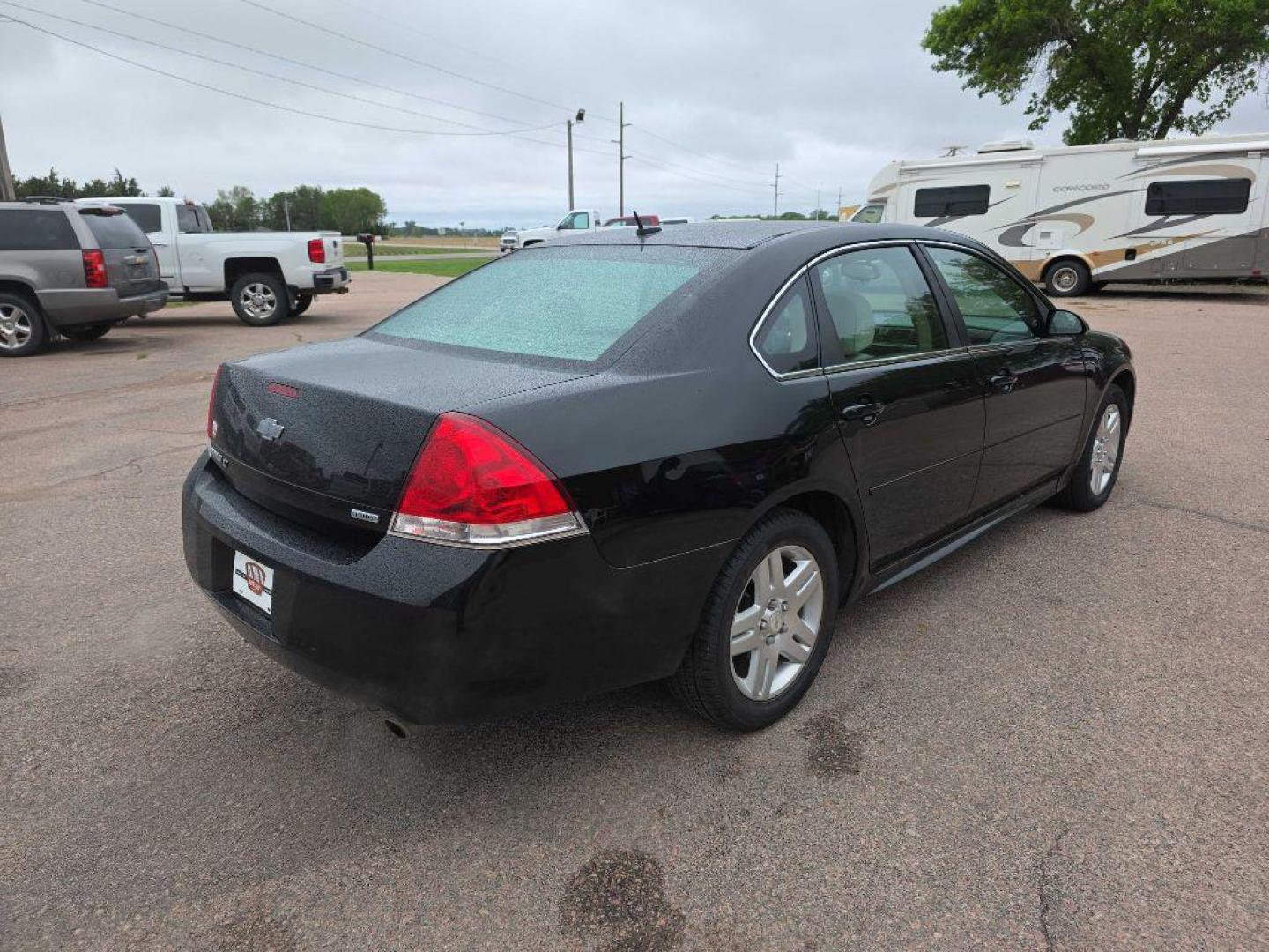 2014 BLACK CHEVROLET IMPALA LIMITED LT (2G1WB5E39E1) with an 3.6L engine, Automatic transmission, located at 495 Old Highway 20 West, South Sioux City, NE, 68776, (402) 494-2677, 42.458408, -96.443512 - Photo#3