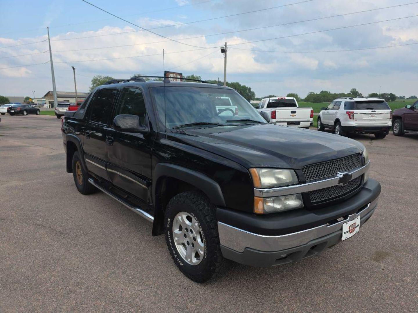 2005 BLACK CHEVROLET AVALANCHE 1500 (3GNEK12Z65G) with an 5.3L engine, Automatic transmission, located at 495 Old Highway 20 West, South Sioux City, NE, 68776, (402) 494-2677, 42.458408, -96.443512 - Photo#5