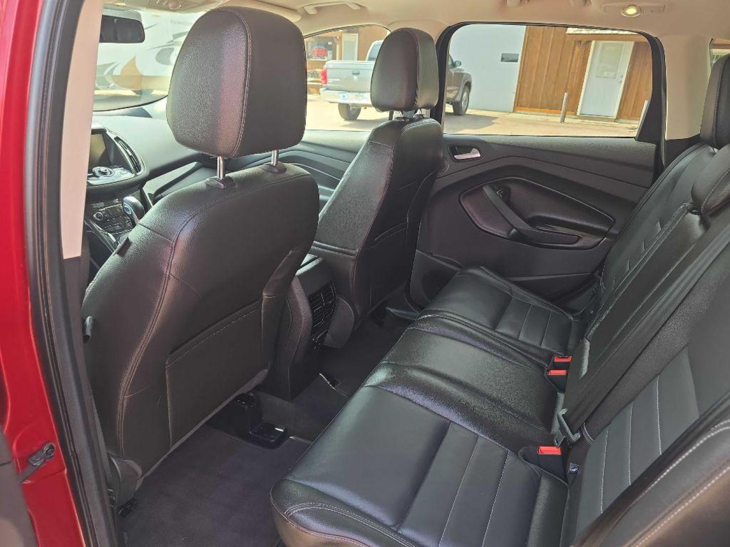 2015 MAROON FORD ESCAPE TITANIUM (1FMCU9J94FU) with an 2.0L engine, Automatic transmission, located at 495 Old Highway 20 West, South Sioux City, NE, 68776, (402) 494-2677, 42.458408, -96.443512 - Photo#4