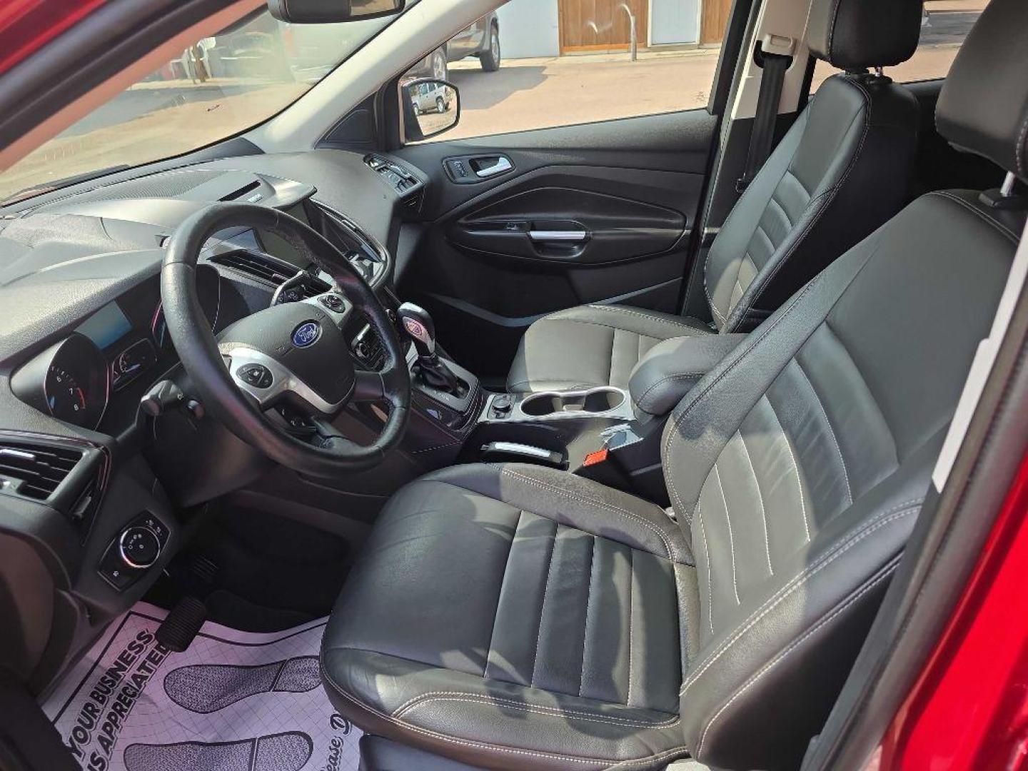 2015 MAROON FORD ESCAPE TITANIUM (1FMCU9J94FU) with an 2.0L engine, Automatic transmission, located at 495 Old Highway 20 West, South Sioux City, NE, 68776, (402) 494-2677, 42.458408, -96.443512 - Photo#6