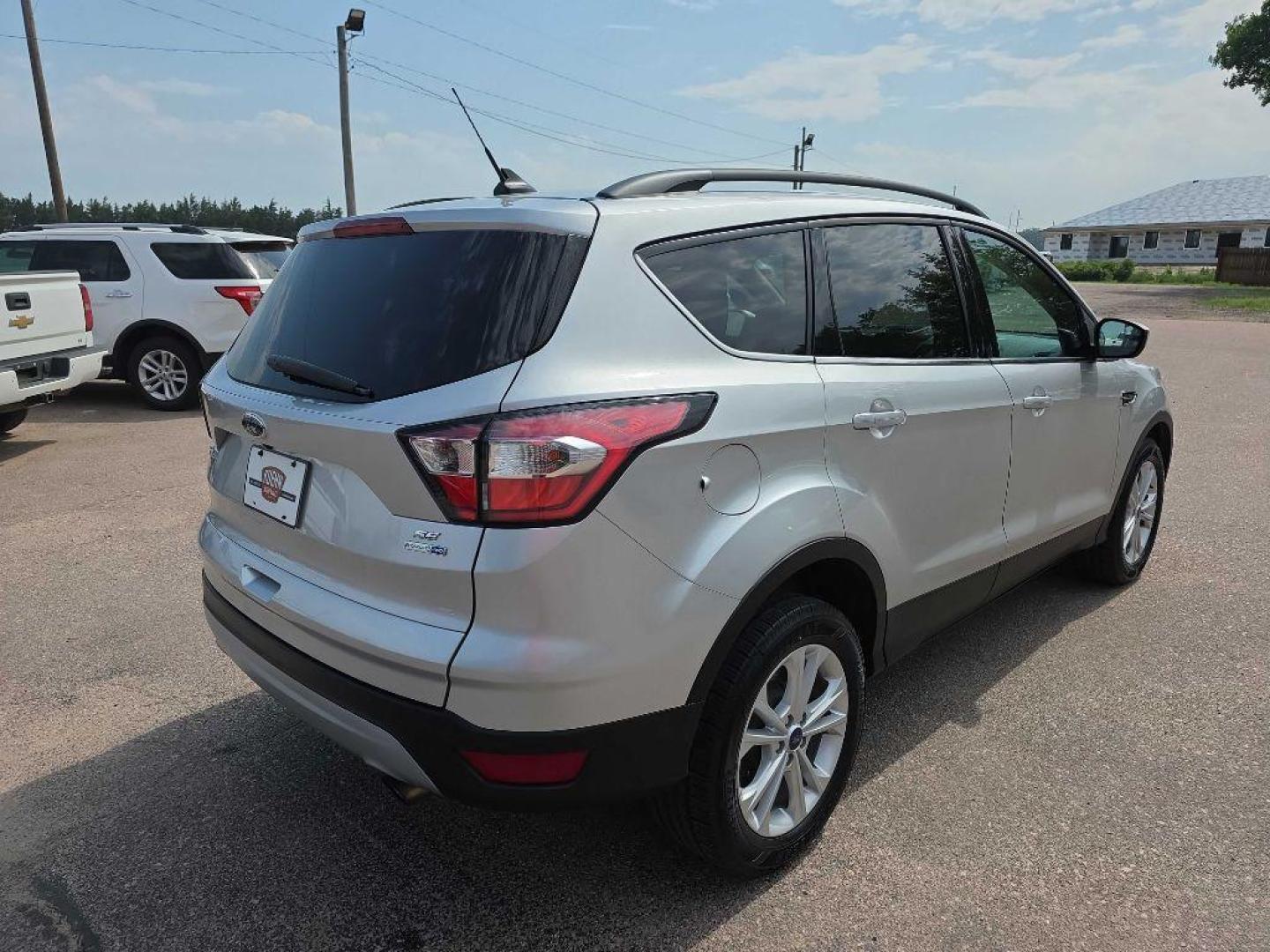 2018 SILVER FORD ESCAPE SE (1FMCU9GD5JU) with an 1.5L engine, Automatic transmission, located at 495 Old Highway 20 West, South Sioux City, NE, 68776, (402) 494-2677, 42.458408, -96.443512 - Photo#3