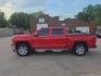 2015 RED CHEVROLET SILVERADO 1500 LTZ (3GCUKSEC3FG) with an 5.3L engine, Automatic transmission, located at 495 Old Highway 20 West, South Sioux City, NE, 68776, (402) 494-2677, 42.458408, -96.443512 - Photo#1
