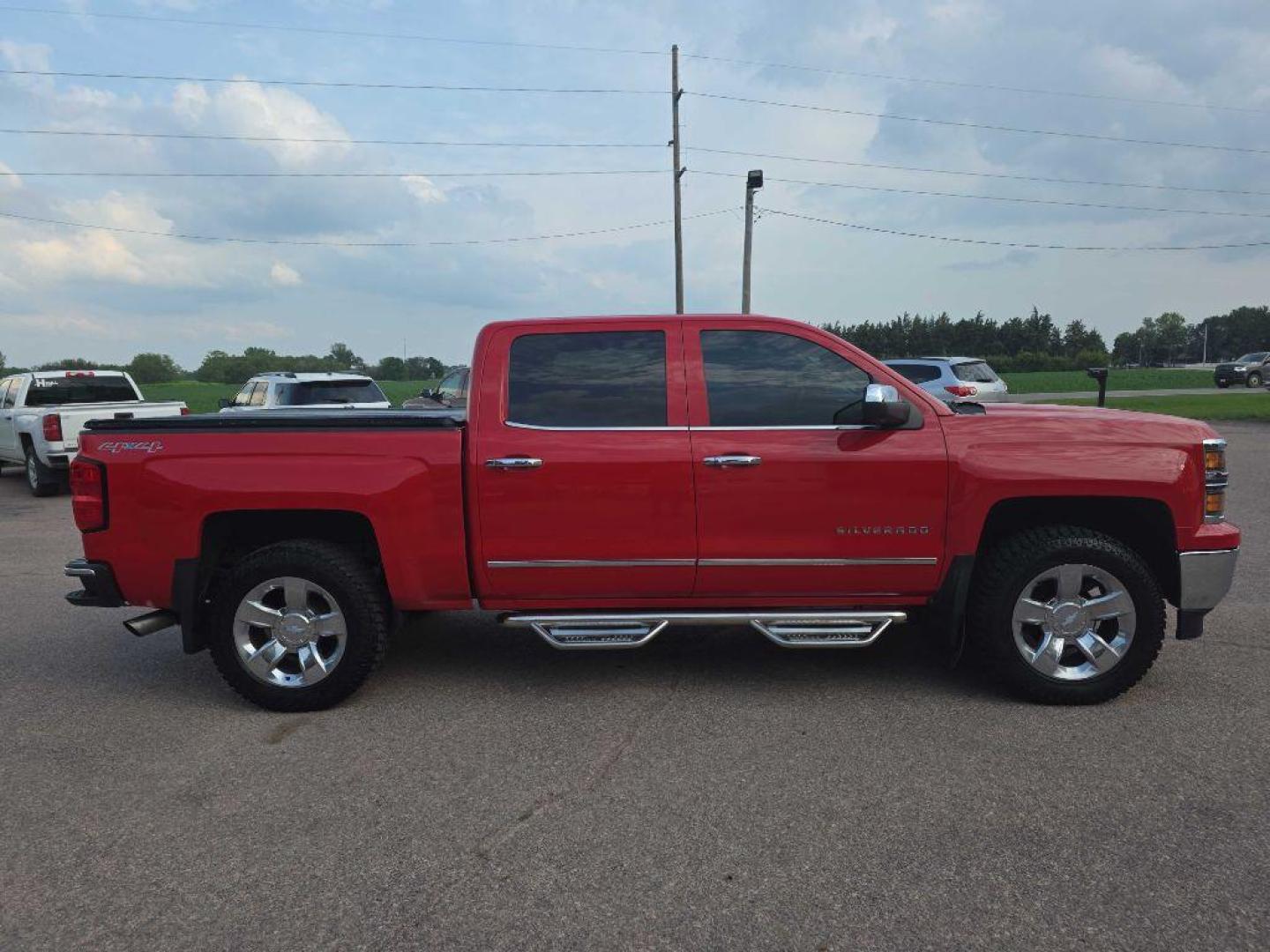 2015 RED CHEVROLET SILVERADO 1500 LTZ (3GCUKSEC3FG) with an 5.3L engine, Automatic transmission, located at 495 Old Highway 20 West, South Sioux City, NE, 68776, (402) 494-2677, 42.458408, -96.443512 - Photo#4
