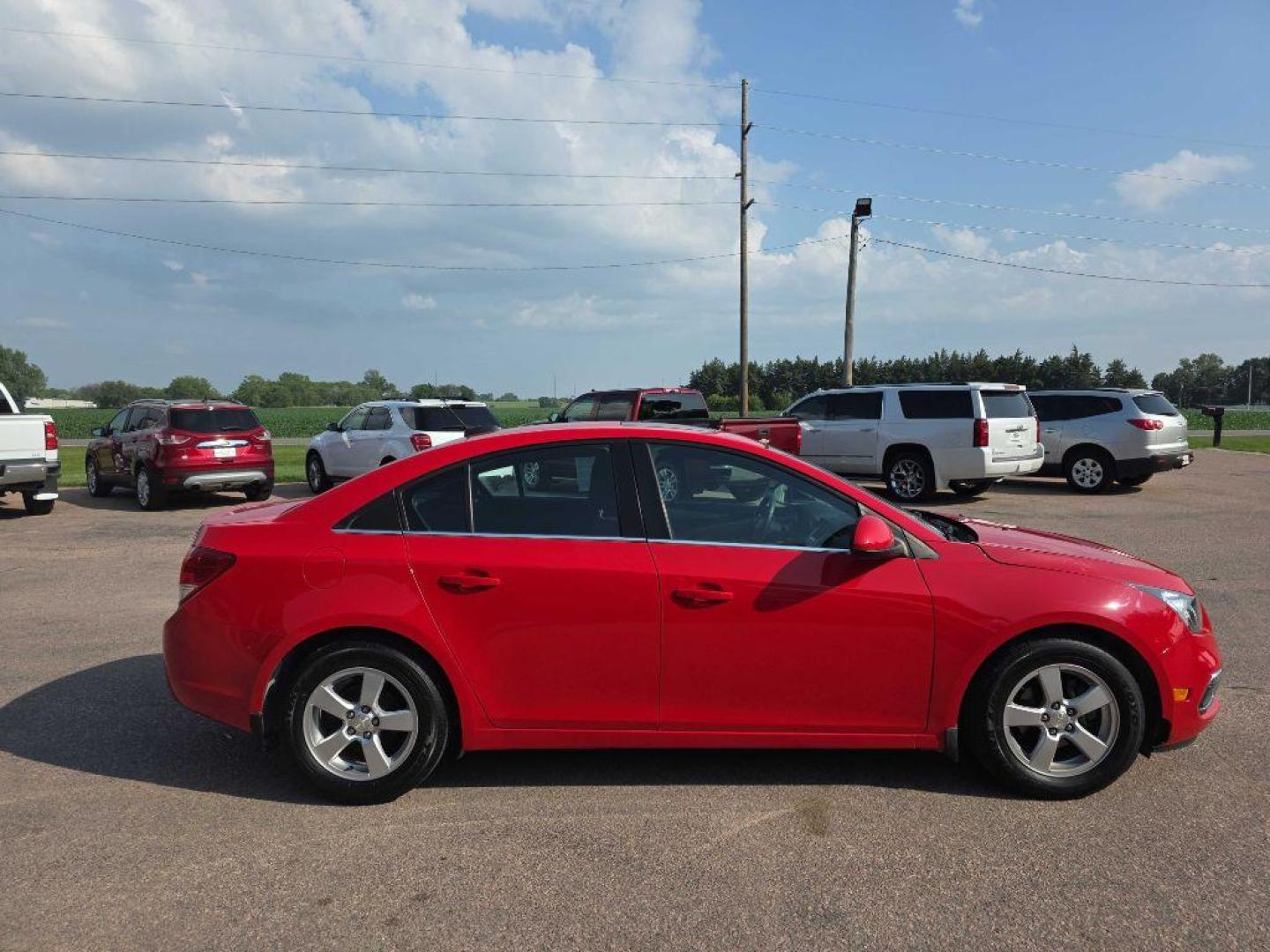2016 RED CHEVROLET CRUZE LIMITED LT (1G1PE5SB1G7) with an 1.4L engine, Automatic transmission, located at 495 Old Highway 20 West, South Sioux City, NE, 68776, (402) 494-2677, 42.458408, -96.443512 - Photo#4
