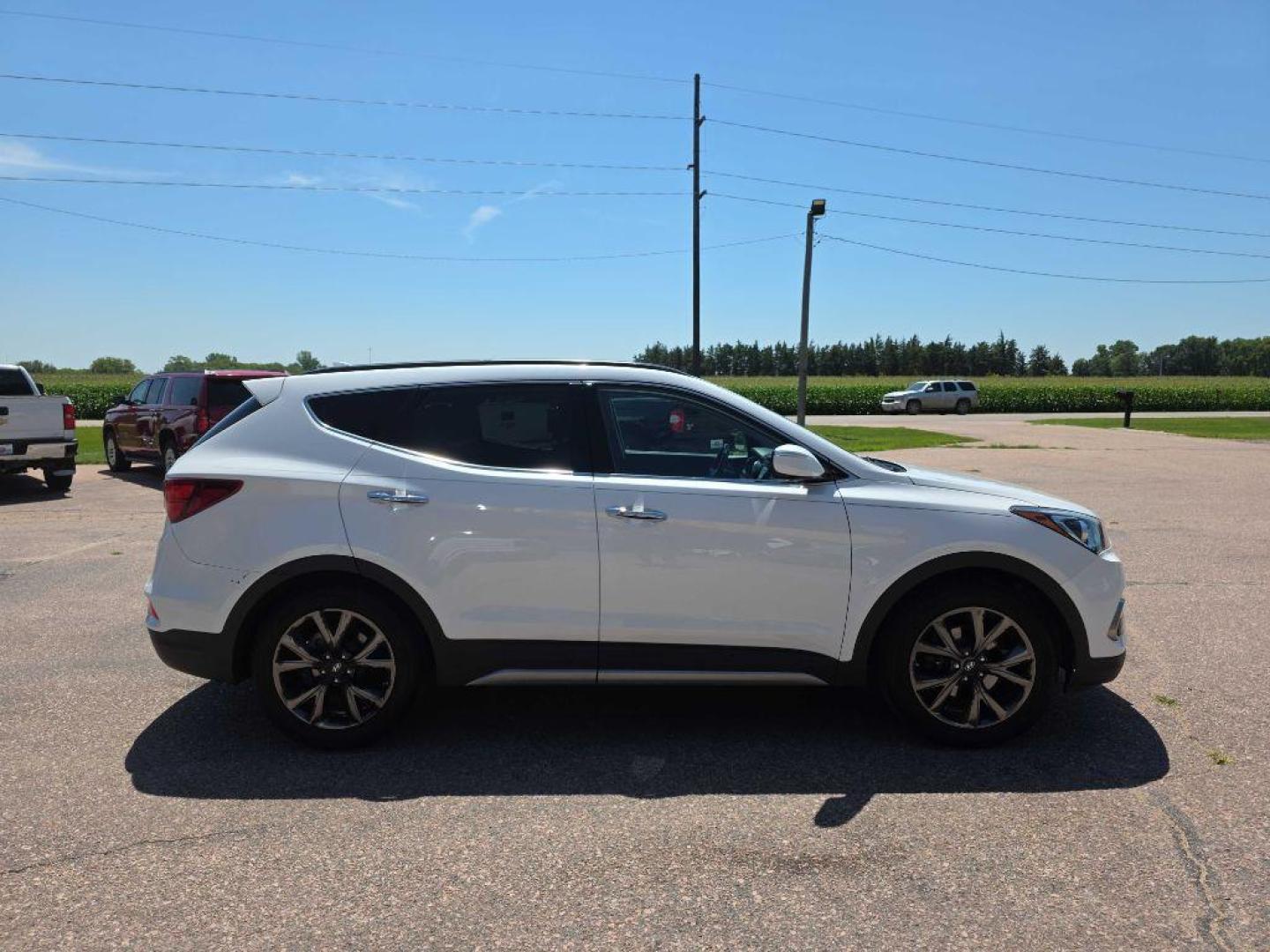 2017 WHITE HYUNDAI SANTA FE SPORT (5XYZW4LA4HG) with an 2.0L engine, Automatic transmission, located at 495 Old Highway 20 West, South Sioux City, NE, 68776, (402) 494-2677, 42.458408, -96.443512 - Photo#1