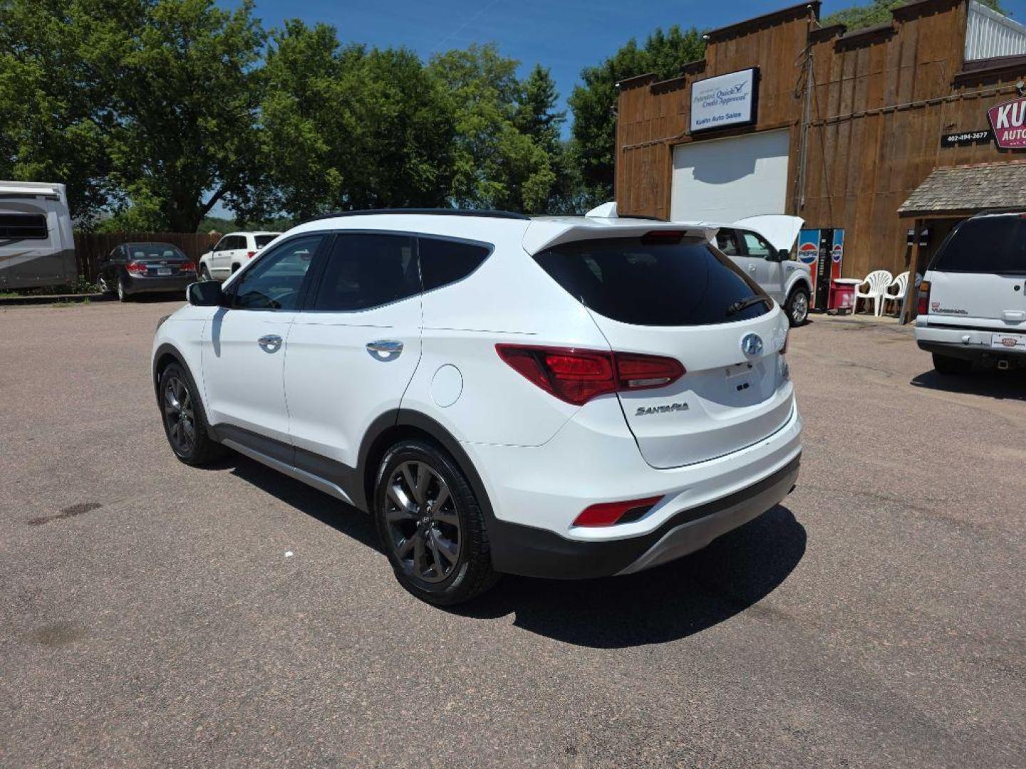 2017 WHITE HYUNDAI SANTA FE SPORT (5XYZW4LA4HG) with an 2.0L engine, Automatic transmission, located at 495 Old Highway 20 West, South Sioux City, NE, 68776, (402) 494-2677, 42.458408, -96.443512 - Photo#2