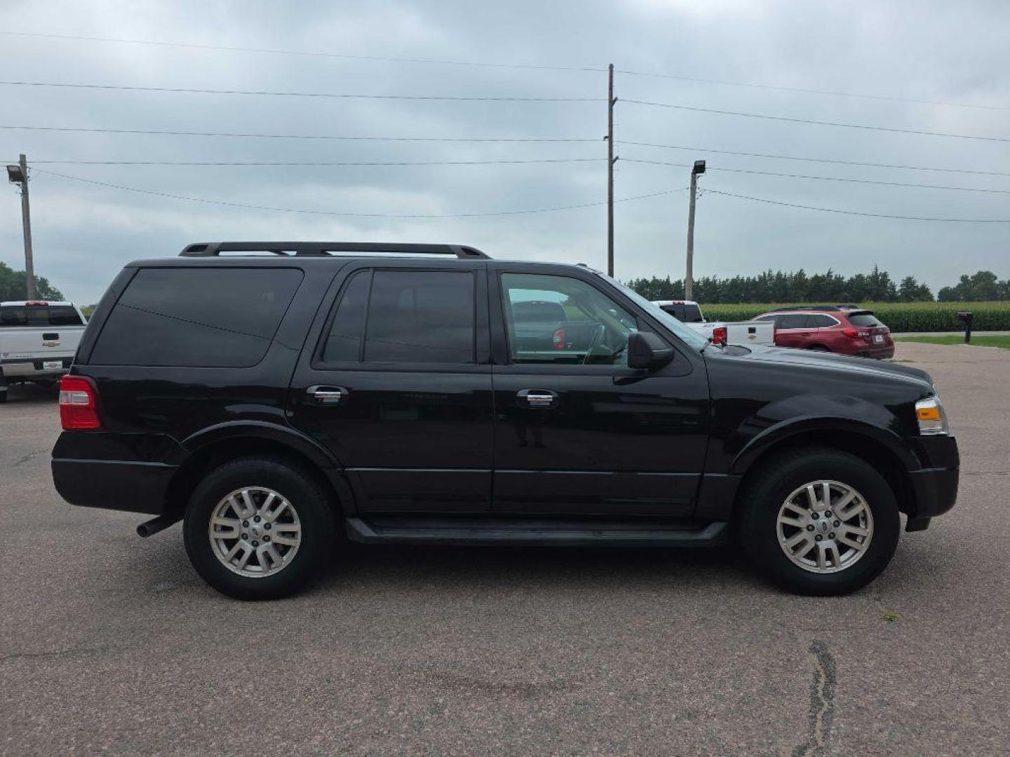 2012 BLACK FORD EXPEDITION XLT (1FMJU1J50CE) with an 5.4L engine, Automatic transmission, located at 495 Old Highway 20 West, South Sioux City, NE, 68776, (402) 494-2677, 42.458408, -96.443512 - Photo#4