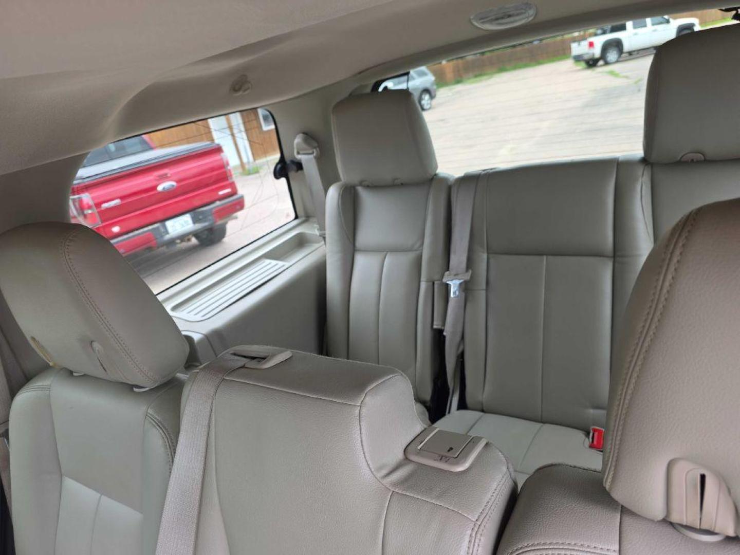 2012 BLACK FORD EXPEDITION XLT (1FMJU1J50CE) with an 5.4L engine, Automatic transmission, located at 495 Old Highway 20 West, South Sioux City, NE, 68776, (402) 494-2677, 42.458408, -96.443512 - Photo#7