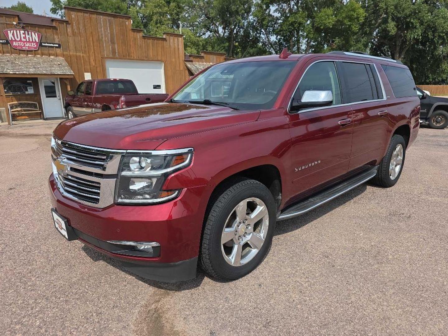 2016 MAROON CHEVROLET SUBURBAN 1500 LTZ (1GNSKJKC2GR) with an 5.3L engine, Automatic transmission, located at 495 Old Highway 20 West, South Sioux City, NE, 68776, (402) 494-2677, 42.458408, -96.443512 - Photo#0