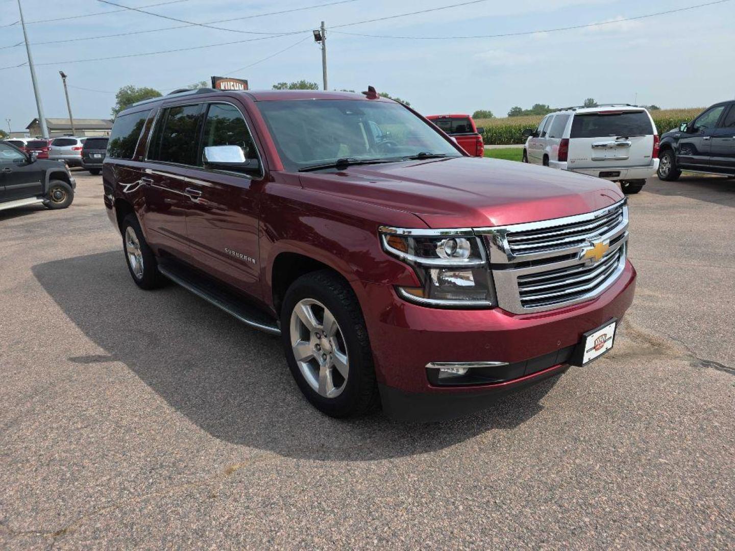 2016 MAROON CHEVROLET SUBURBAN 1500 LTZ (1GNSKJKC2GR) with an 5.3L engine, Automatic transmission, located at 495 Old Highway 20 West, South Sioux City, NE, 68776, (402) 494-2677, 42.458408, -96.443512 - Photo#5