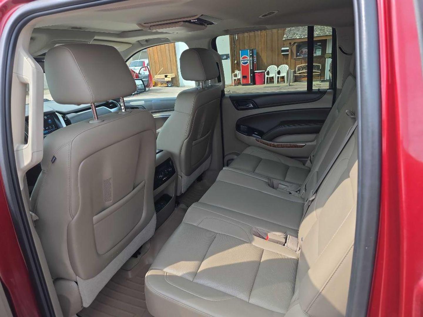 2016 MAROON CHEVROLET SUBURBAN 1500 LTZ (1GNSKJKC2GR) with an 5.3L engine, Automatic transmission, located at 495 Old Highway 20 West, South Sioux City, NE, 68776, (402) 494-2677, 42.458408, -96.443512 - Photo#6