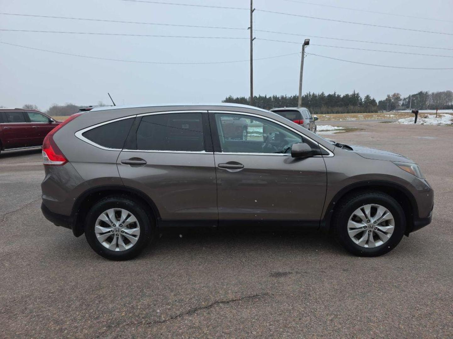2012 TAN HONDA CR-V EXL (5J6RM4H78CL) with an 2.4L engine, Automatic transmission, located at 495 Old Highway 20 West, South Sioux City, NE, 68776, (402) 494-2677, 42.458408, -96.443512 - Photo#1