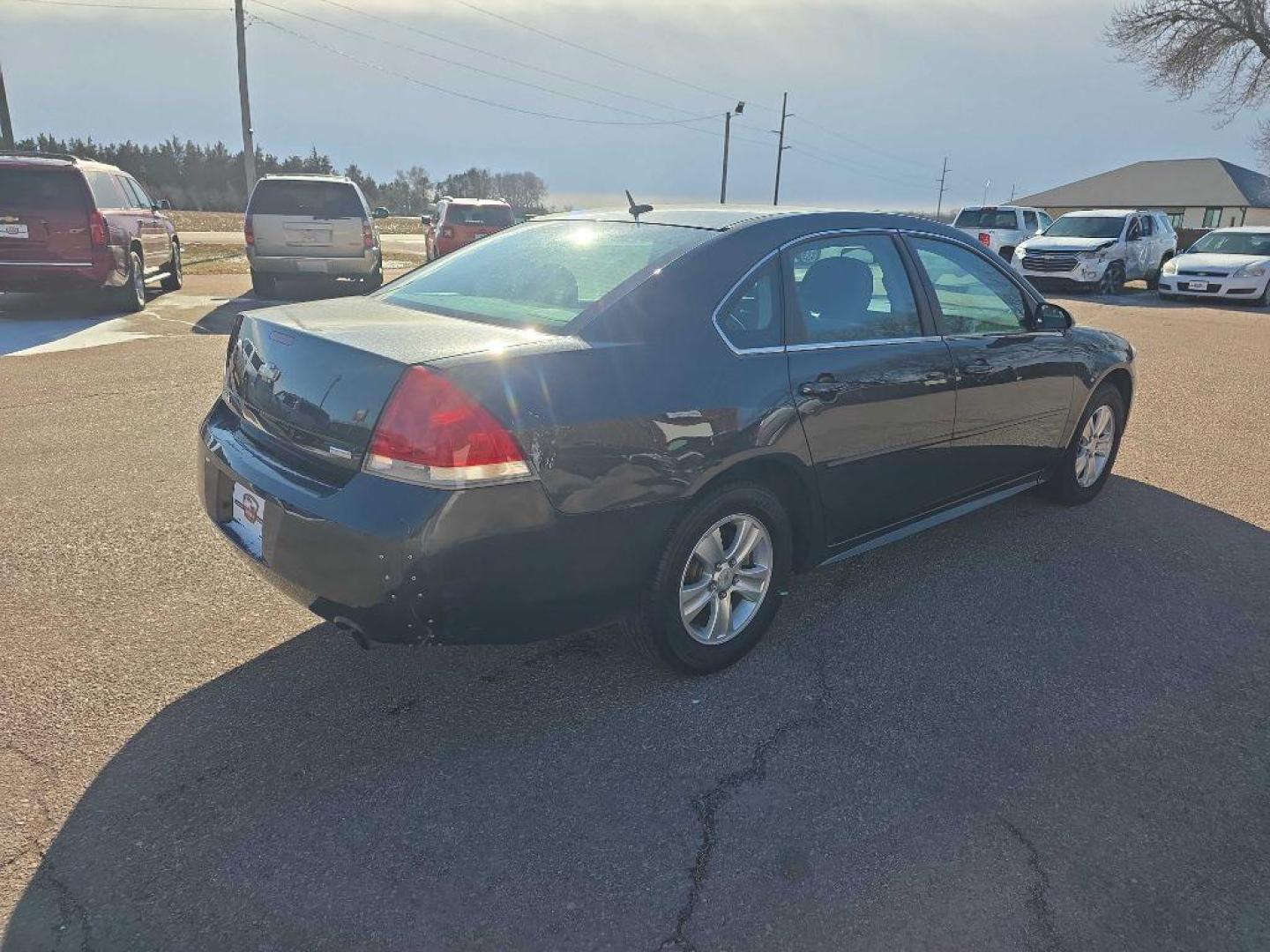 2016 BLACK CHEVROLET IMPALA LIMITED LS (2G1WA5E30G1) with an 3.6L engine, Automatic transmission, located at 495 Old Highway 20 West, South Sioux City, NE, 68776, (402) 494-2677, 42.458408, -96.443512 - Photo#3